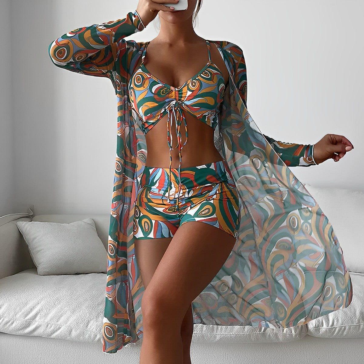 LM | Swimsuit with swirl pattern and overlay